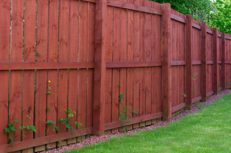 Fenced yard with fresh paint